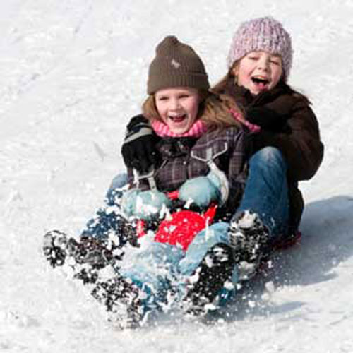 Photo of children sledding